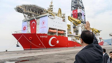 Drilling ship Yavuz with Turkish flags, symbolizing Turkey's ongoing exploration plans in the easter.