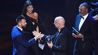 Lionel Messi and Megan Rapinoe receiving the best player award at a sports ceremony.