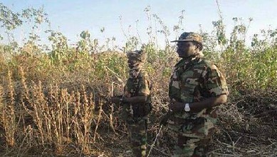 Two soldiers in camouflage uniforms during peace negotiations in Juba.