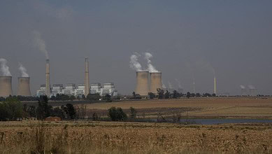 Coal power plants in South Africa releasing large amounts of smoke.