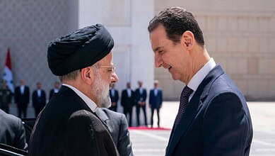 بشار الأسد و إبراهيم رئيسي