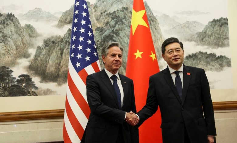 وزير الخارجية الصيني مع نظيره الأمريكي