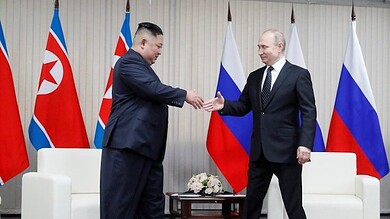 فلاديمير بوتين مع كيم جونغ أون