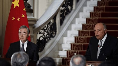 وانغ يي مع سامح شكري