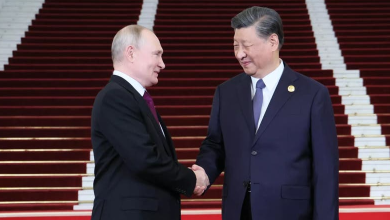 Xi