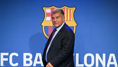 FC Barcelona official announcement featuring club president in front of the club logo.